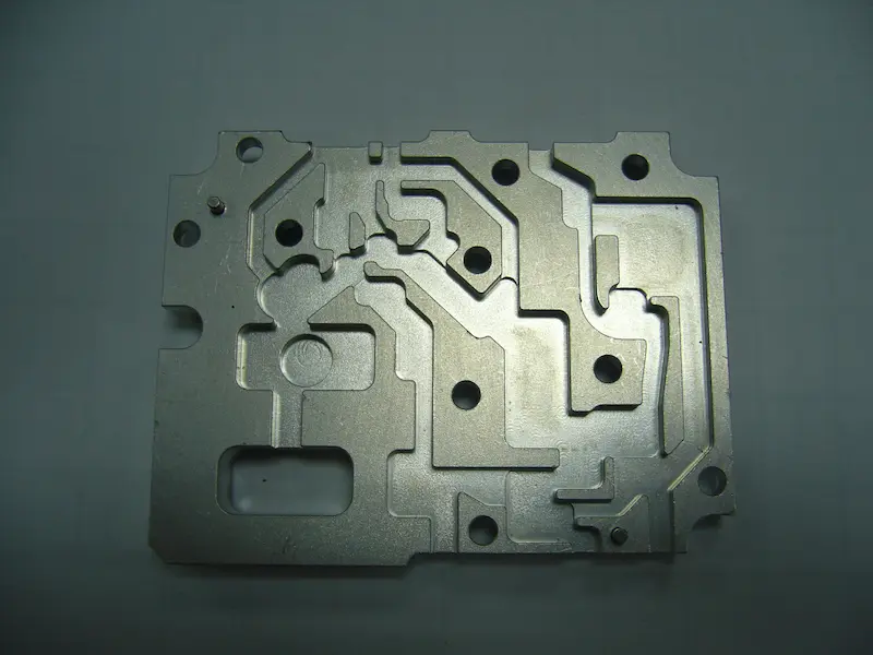 Electroplated ABS plastic part with high gloss metallic surface finish