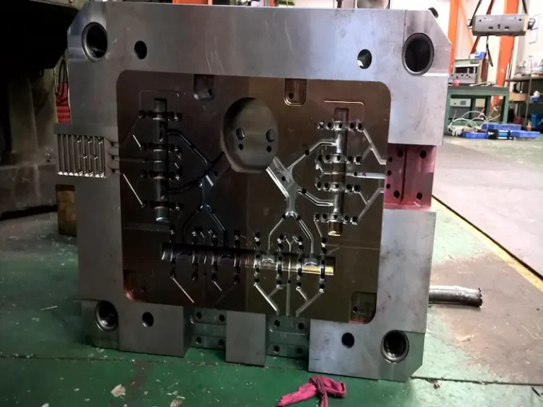 Two color injection molded plastic parts with dual-color appearance and functional design