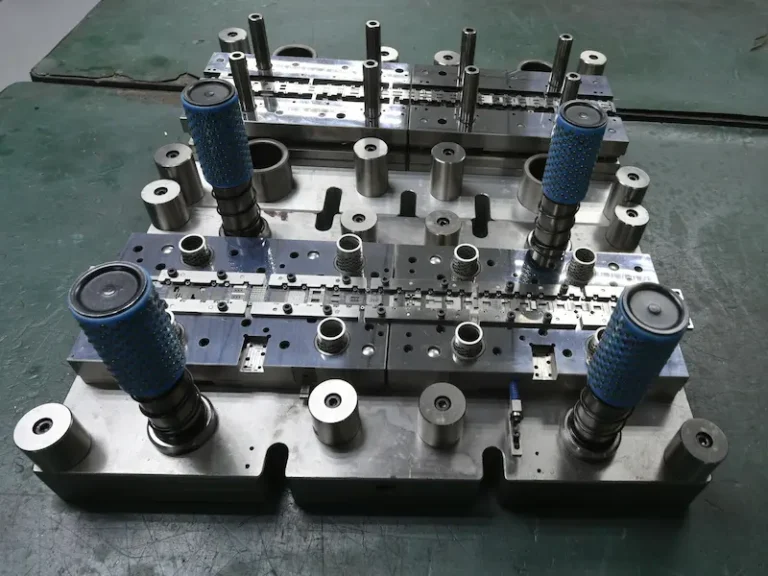 Vacuum forming process shaping heated plastic sheet over a mold