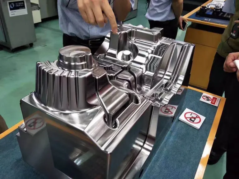 5 axis CNC machine machining a complex precision metal part