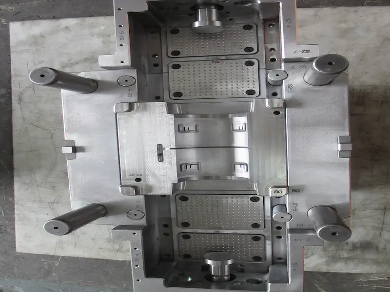 Rubber injection molding machine producing precision rubber parts in an industrial workshop