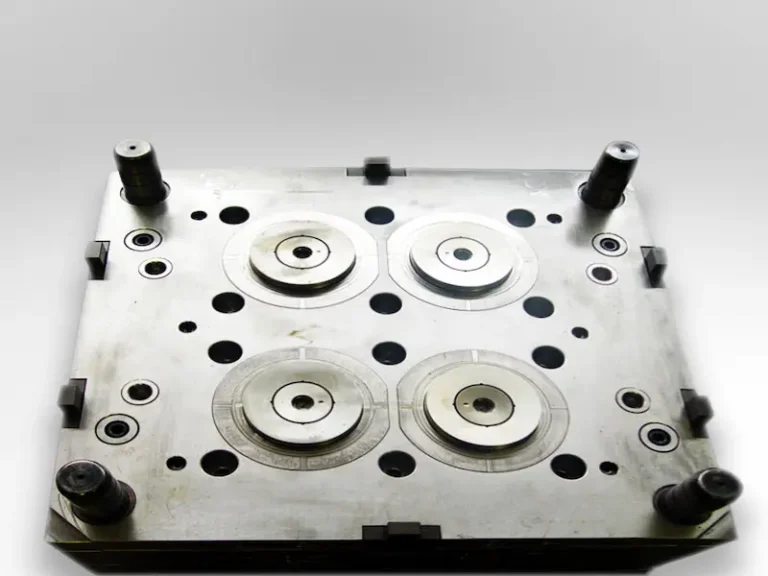 Engineers reviewing 3D printed prototypes and material options for product development