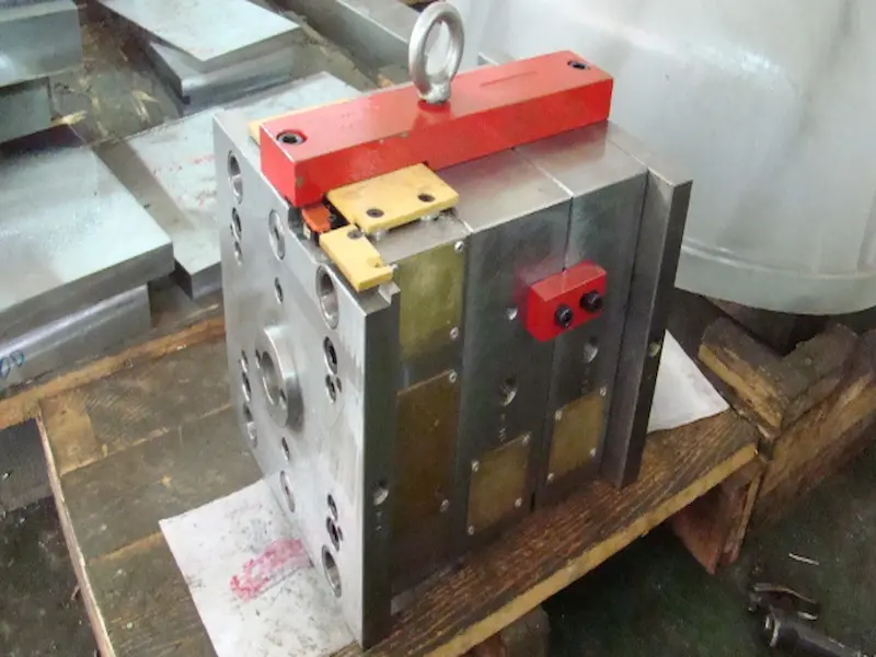 Precision mold finishing polishing and assembly of steel mold components in a toolroom