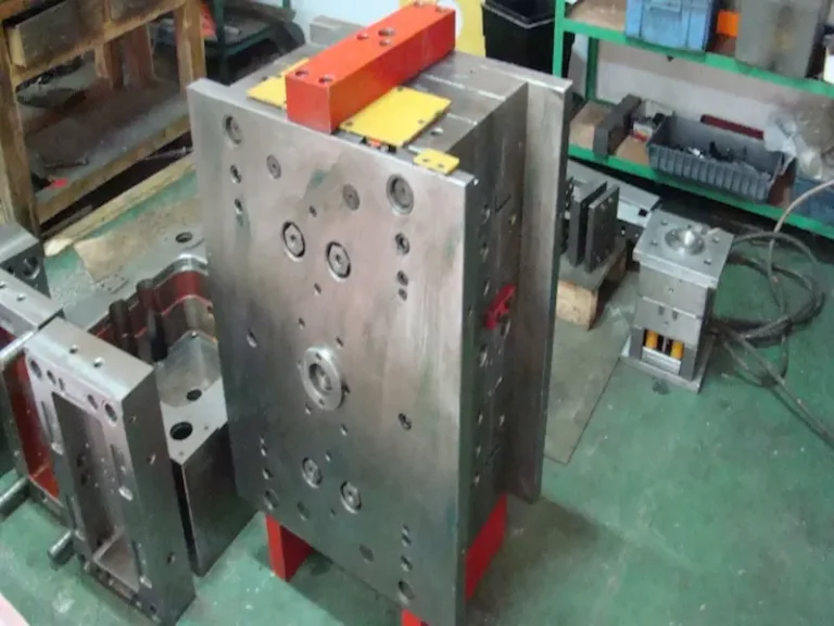 Precision grinding of mold steel parts with coolant and grinding wheel control to reduce deformation