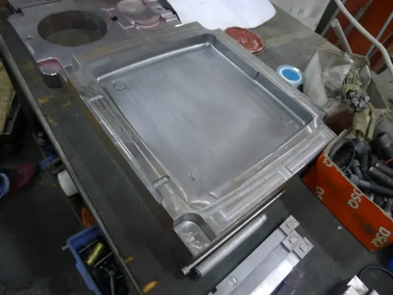 Aluminum extrusion die showing secondary welding chamber and secondary diversion design for profile flow optimization