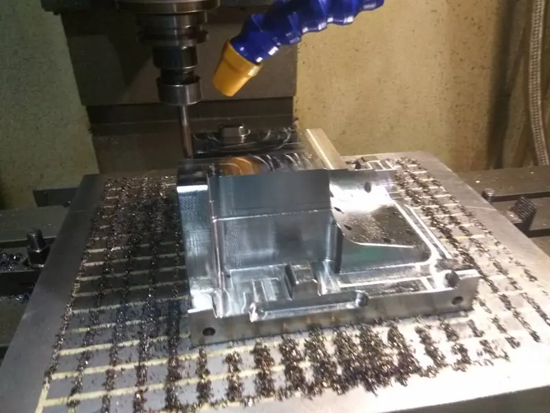 Injection molded plastic part with shock marks and flow pattern defects near the gate