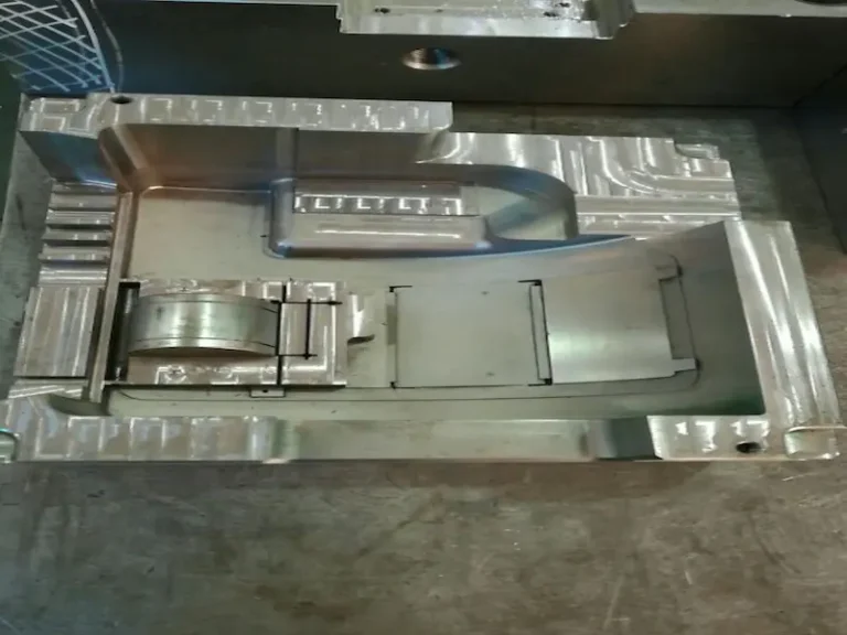 Two-color injection molding machine producing dual-color plastic components with rotating mold system