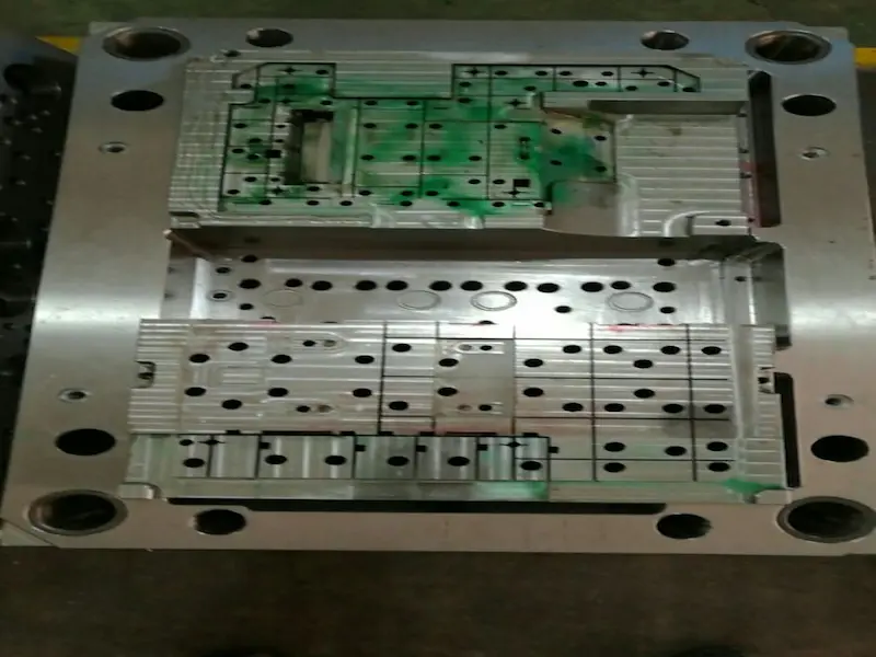 Two-color injection mold design comparison between core shift and rotary core structure