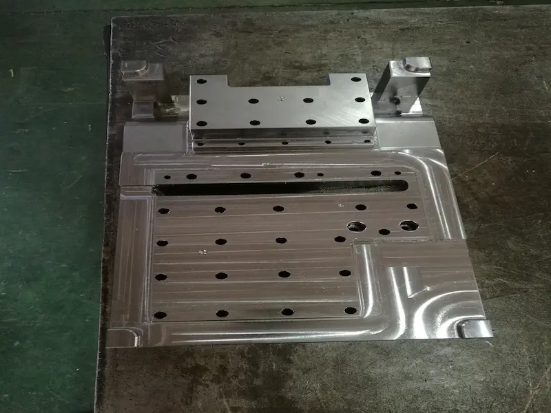 Aluminum extrusion die design showing metal flow balance working belt layout and die strength analysis