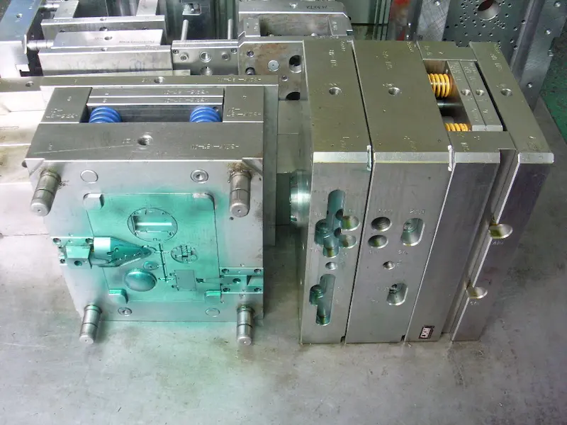 Injection molded plastic parts showing uneven color distribution caused by poor masterbatch dispersion during molding