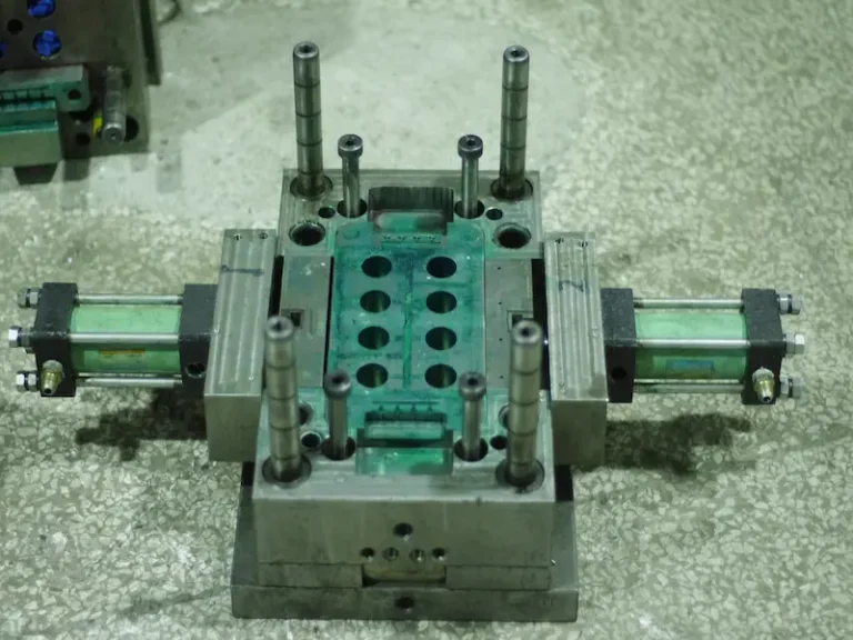 ABS injection molding process showing machine mold and plastic parts production