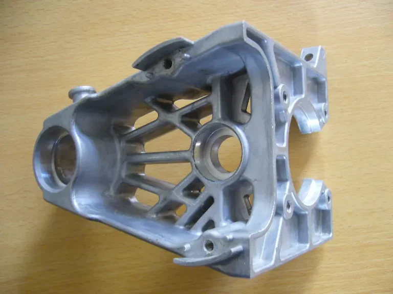 Die casting mold and casting design showing ribbed part structure, insert details, rounded corners, and stress-sensitive mold areas.