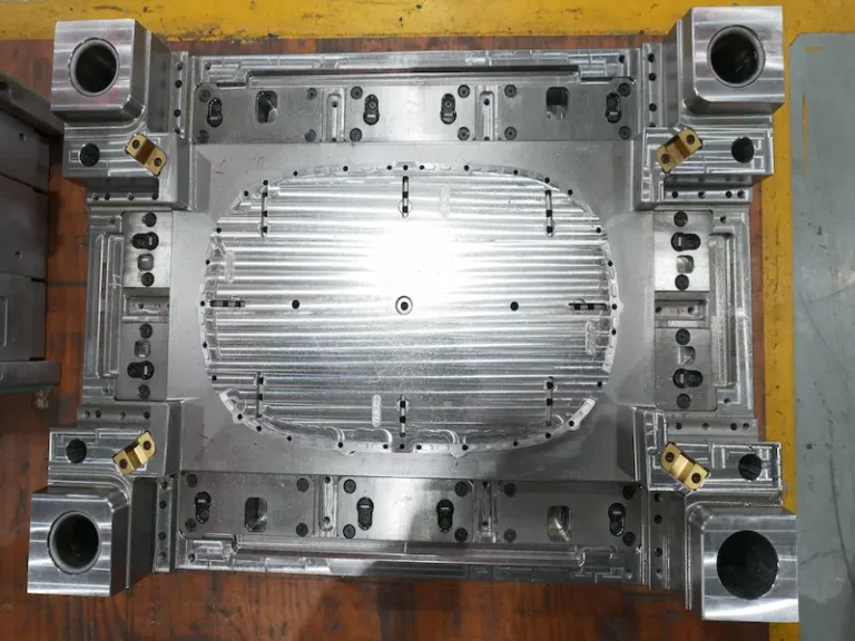 Engineer using CAD software for modular mold design and assembly development
