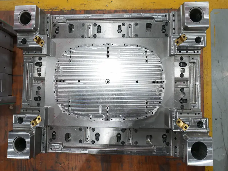 Engineer using CAD software for modular mold design and assembly development