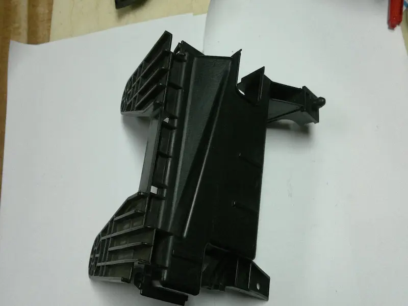 Plastic part blistering and swelling after demolding caused by insufficient cooling and thick wall sections