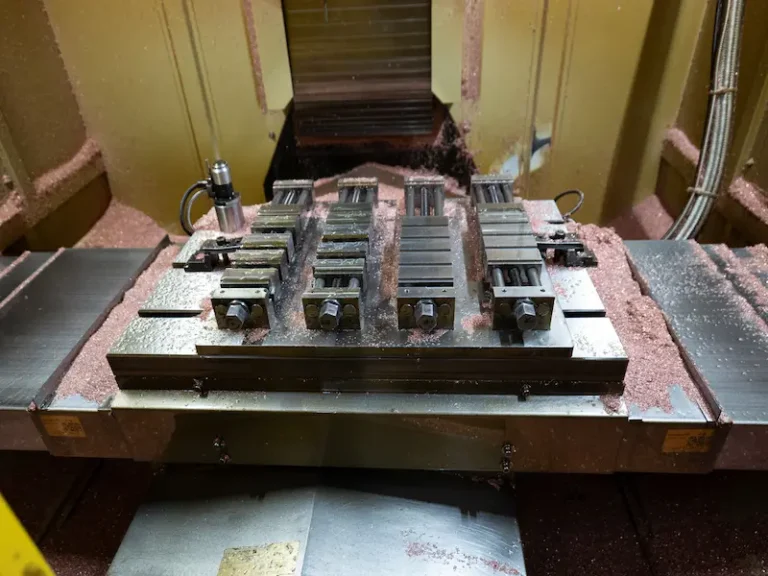 Engineer recording and analyzing injection molding trial data for mold correction and stable production