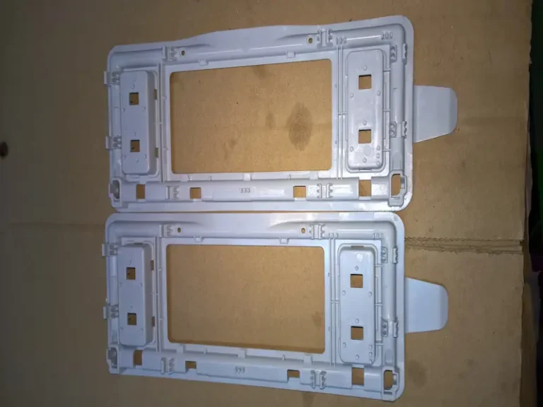 Vertical injection molding machine for insert molding precision connectors and electronic components